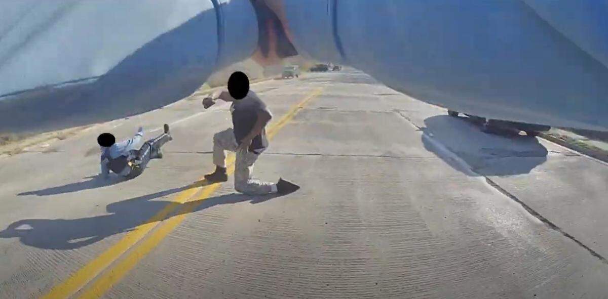 Body camera footage from a Nov. 22, 2021, altercation between two Kansas City, Kansas, police officers and a former KCK detective shows the encounter turn deadly.