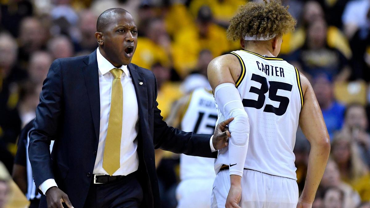 MU coach Dennis Gates tries to get his team organized during the second half of last Saturday’s game against KU at Mizzou Arena.