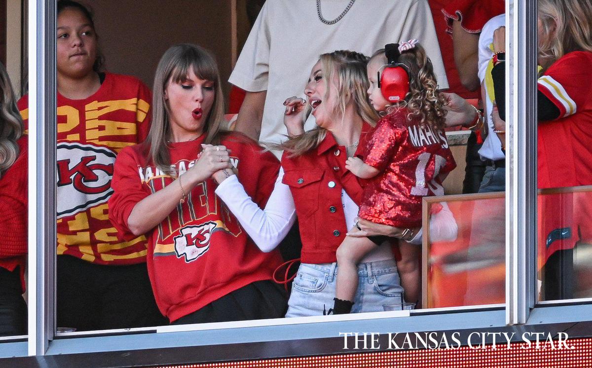 Taylor Swift and Brittany Mahomes don’t hold back their enthusiasm when watching Chiefs games. Here they had a special handshake during the Chiefs game against the Los Angeles Chargers on Oct. 22, 2023.
