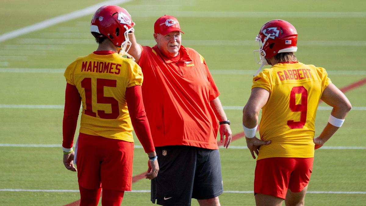 Kansas City Chiefs head coach Andy Reid laughs with quarterbacks Patrick Mahomes (15) and Blaine Gabbert (9) during the first day of NFL football training camp on Wednesday, July 19, 2023, in St. Joseph, Mo.