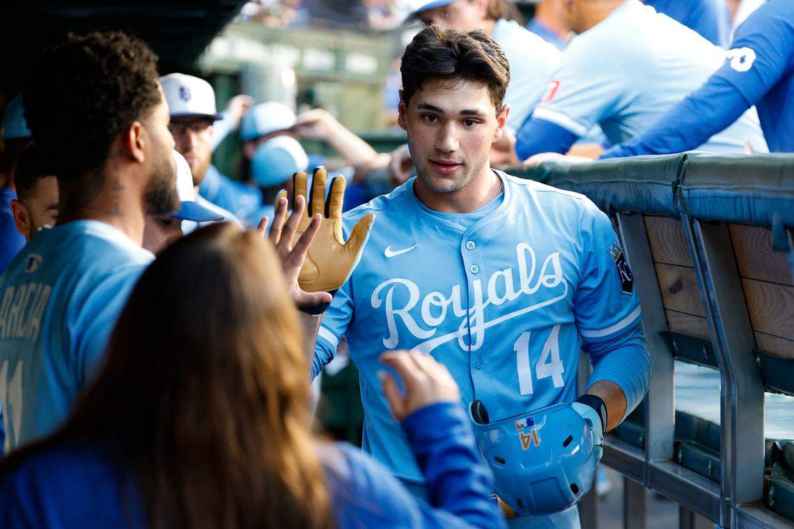 Kansas City Royals right fielder Jac Caglianone gets high-fives in the dugout after hitting a solo home run during the second inning of a July 21, 2025 Major League Baseball game against the Cubs at Wrigley Field in Chicago.