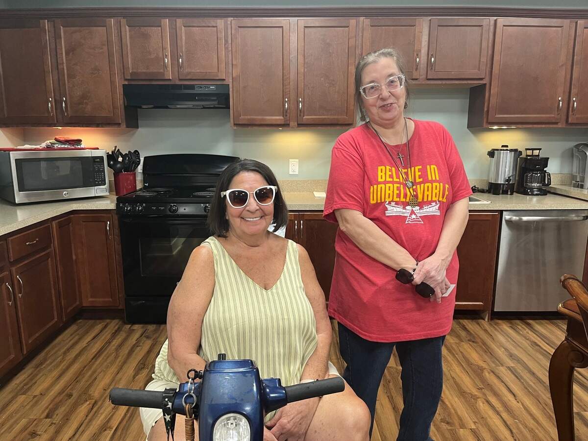 Gigi Harrington (left) and Cindy Bryant (right) said they’ve had a good experience at Palmer Place and with property manager Kim Schwart.
