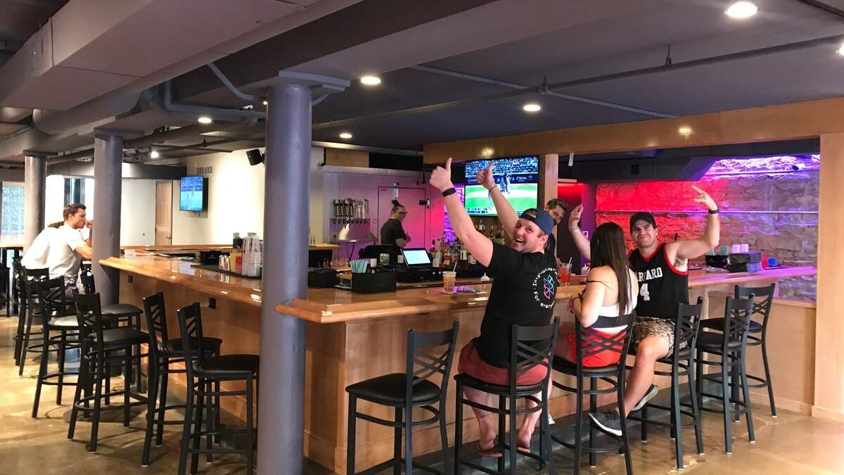 Customers at Block 15 Tavern & Exchange in the River Market. The bar will soon close after opening in 2022.