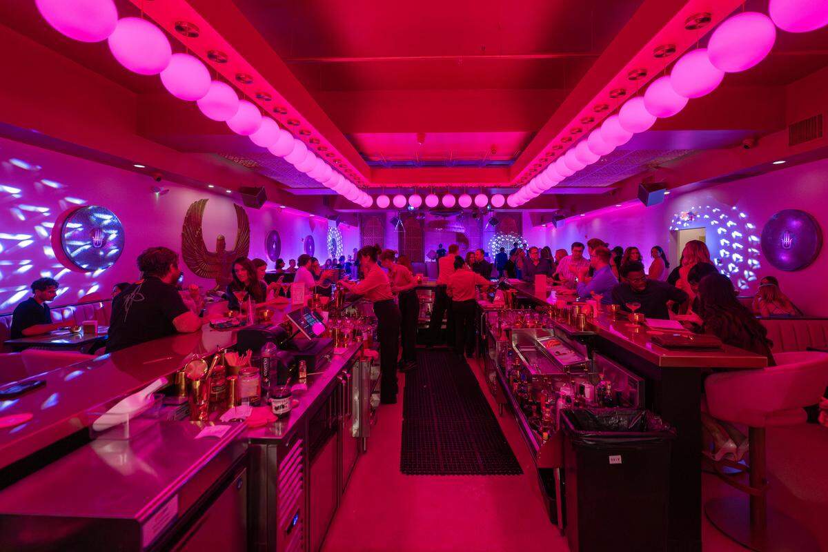 Laila Lounge is bathed in pink and fuchsia lighting on Friday, Aug. 8, 2025, in Kansas City.