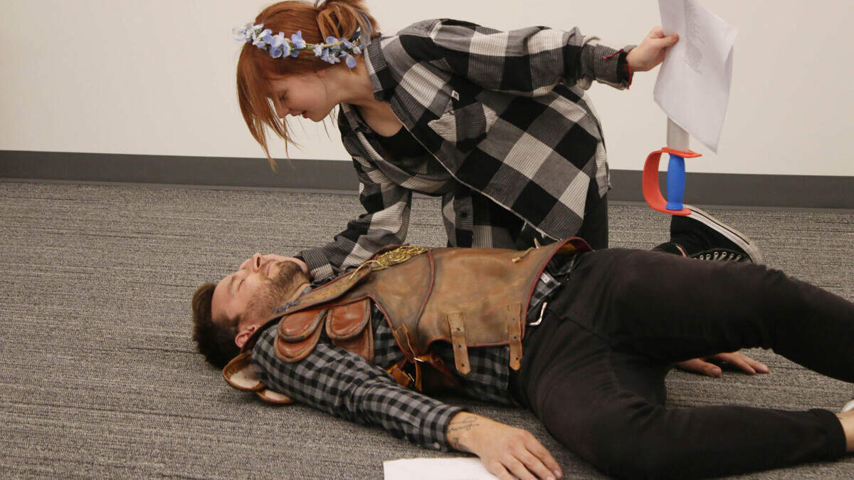 Lee’s Summit resident Ava Chiarelli, 13, acts out a scene from the Pyramus and Thisbe portion of “A Midsummer Night’s Dream” with her father, Adam Chiarelli. The two were attending a Project Shakespeare workshop at the Lee’s Summit branch of the Mid-Continent Library.