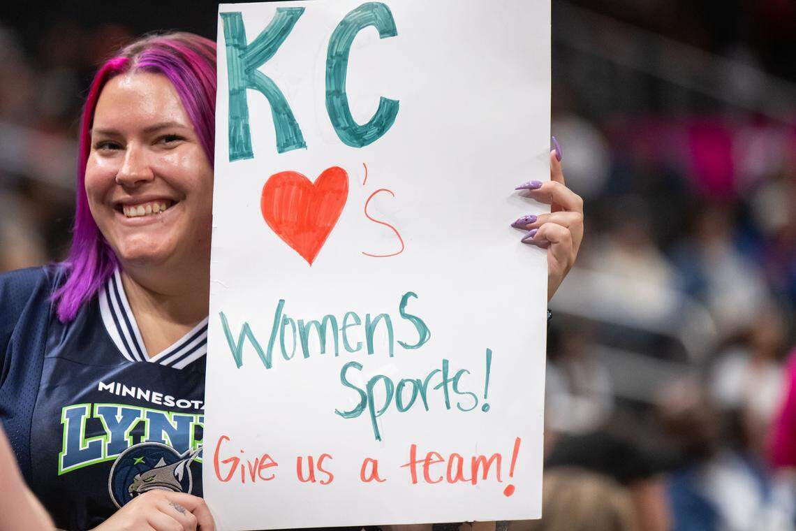 A Minnesota Lynx fan holds sign during a break in action of the WNBA preseason game featuring the Lynx vs. the Nigeria women’s basketball team on Monday, April 27, 2026, at T-Mobile Center.