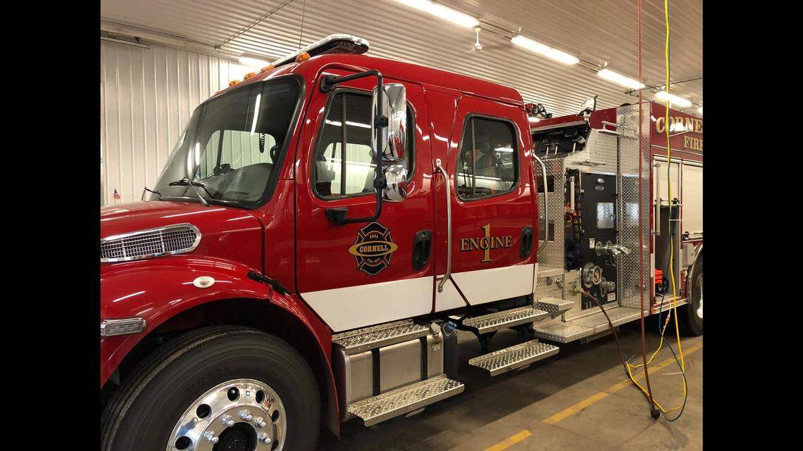 A firefighter in Wisconsin was shot after heat from a structure fire caused a gun to discharge, the Cornell fire chief said.