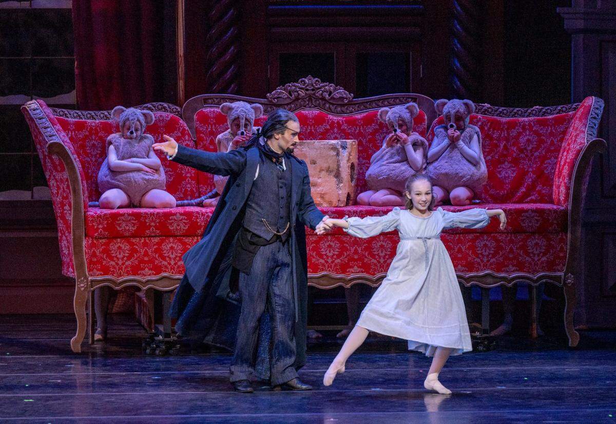 Gavin Abercrombie and Samantha Stortzum as Dr. Drosselmeier and Clara perform in the Battle Scene during the final dress rehearsal of “The Nutcracker.”