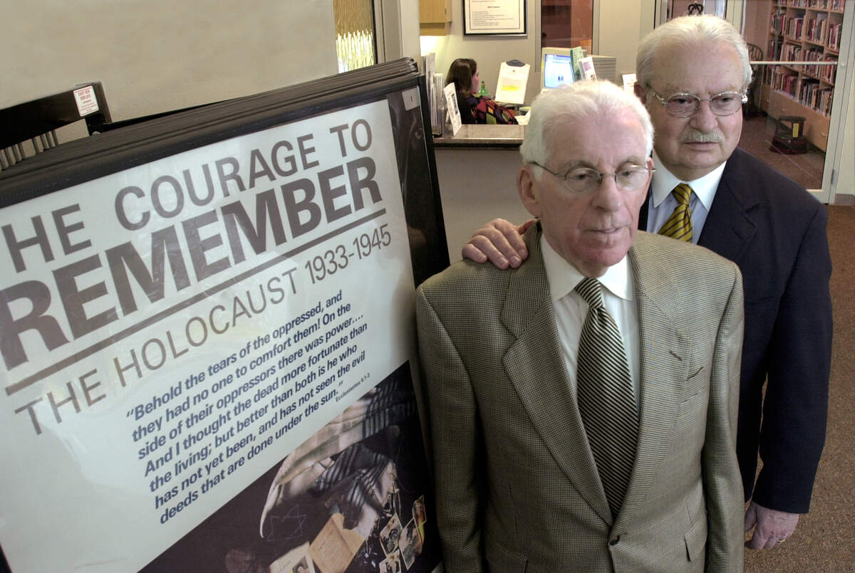 Isak Federman, left, and Jack Mandelbaum, seen here in 2003, co-founded the Midwest Center for Holocaust Education, located at the Jewish Community Center in Overland Park.