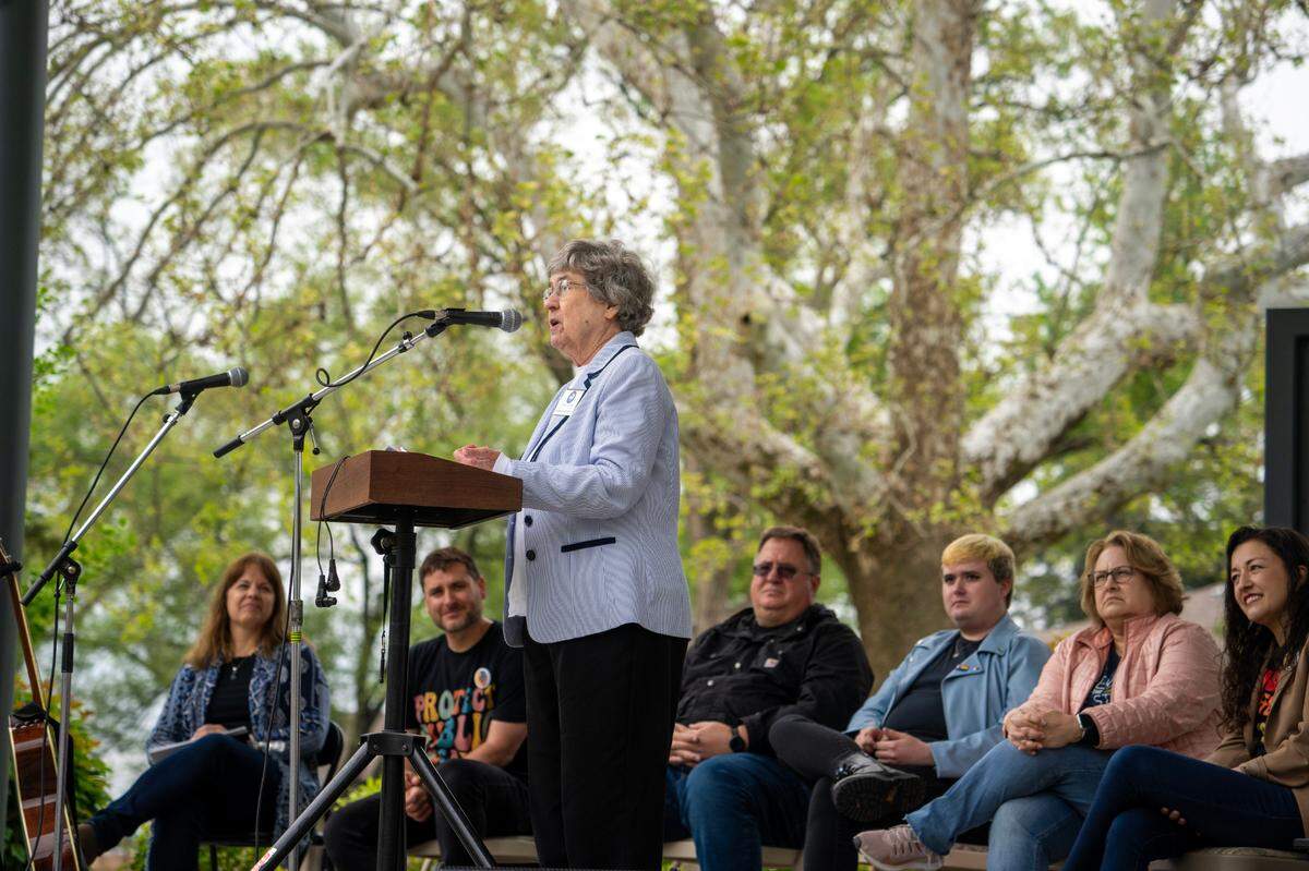 Sister Barbara McCracken speaking in April a the Free State Rally in Overland Park.