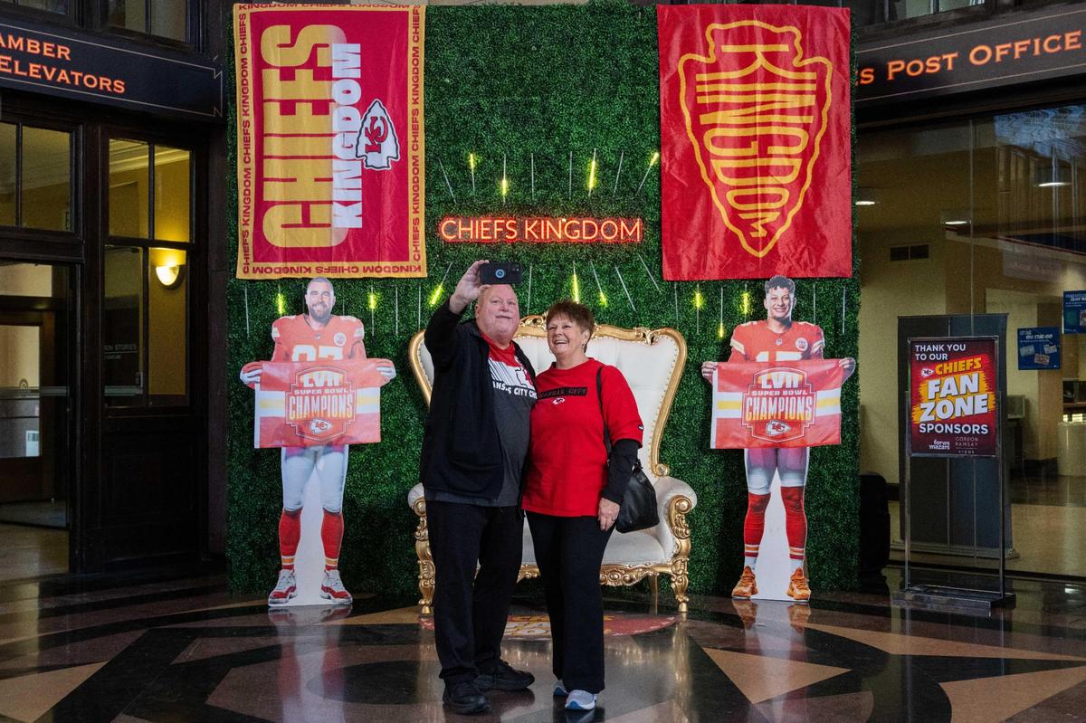Kurt & Lisa Oidtman take a selfie in front of one of this year’s Chiefs Fan Zone installment at Union Station in Kansas City on Thursday, Jan. 16, 2025.