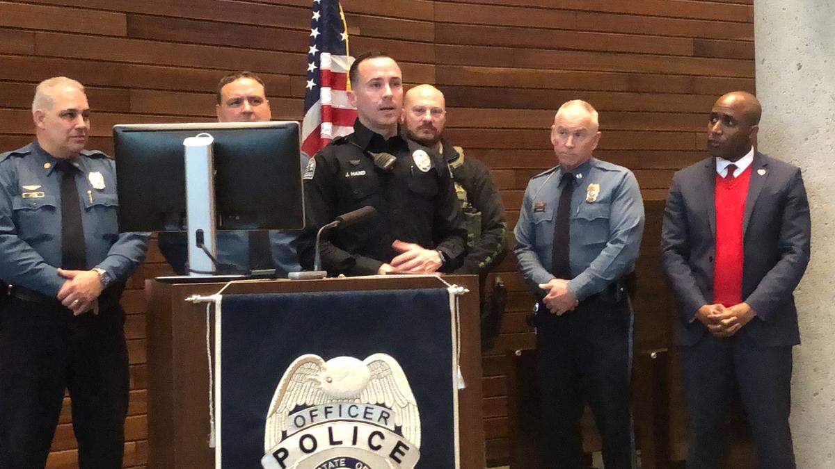 Independence police tactical officer J.T. Hand describes helping apprehend a man who drove through a police barricade onto the Super Bowl parade route Wednesday in downtown Kansas City. Officials held a news conference Thursday at Kansas City Police Department headquarters to discuss incidents during the parade.
