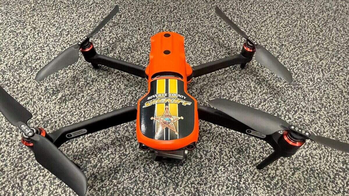 A drone spotted an injured driver collapsed on railroad tracks as a train approached, Minnesota cops say.