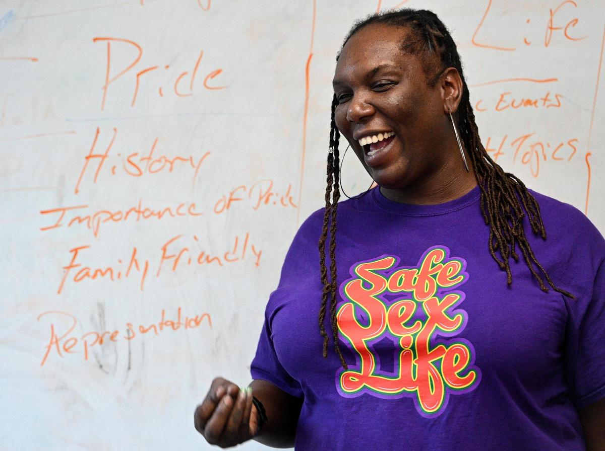Korea Kelly, a board member at the Kansas City Pride Community Alliance, brainstorms topics with co-hosts preparing for a new event. Kelly is one of the leaders planning the KC Pride festival in June.