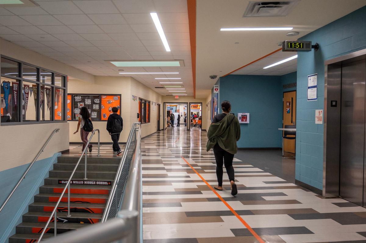 Staff and students walk the halls of Gloria Willis Middle School on Tuesday, April 16, 2024, in Kansas City, Kansas.