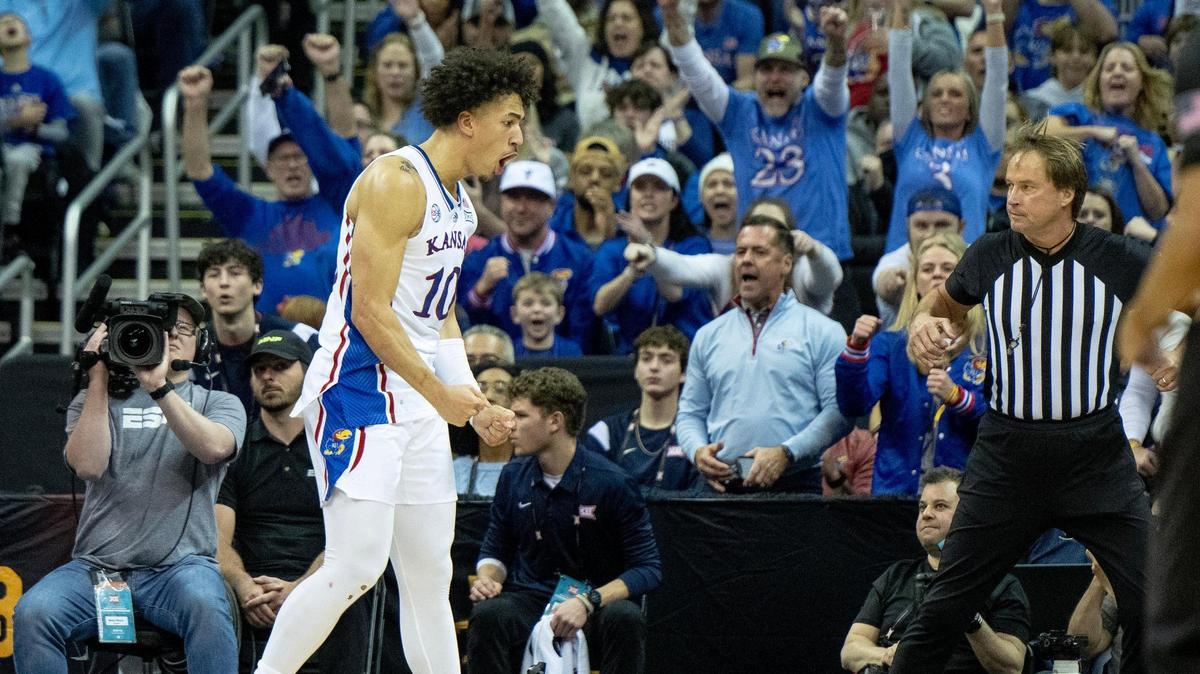 Kansas forward Jalen Wilson (10) celebrates a basket against Texas during the Big 12 Conference tournament championship basketball game Saturday, March 11, 2023, in Kansas City.