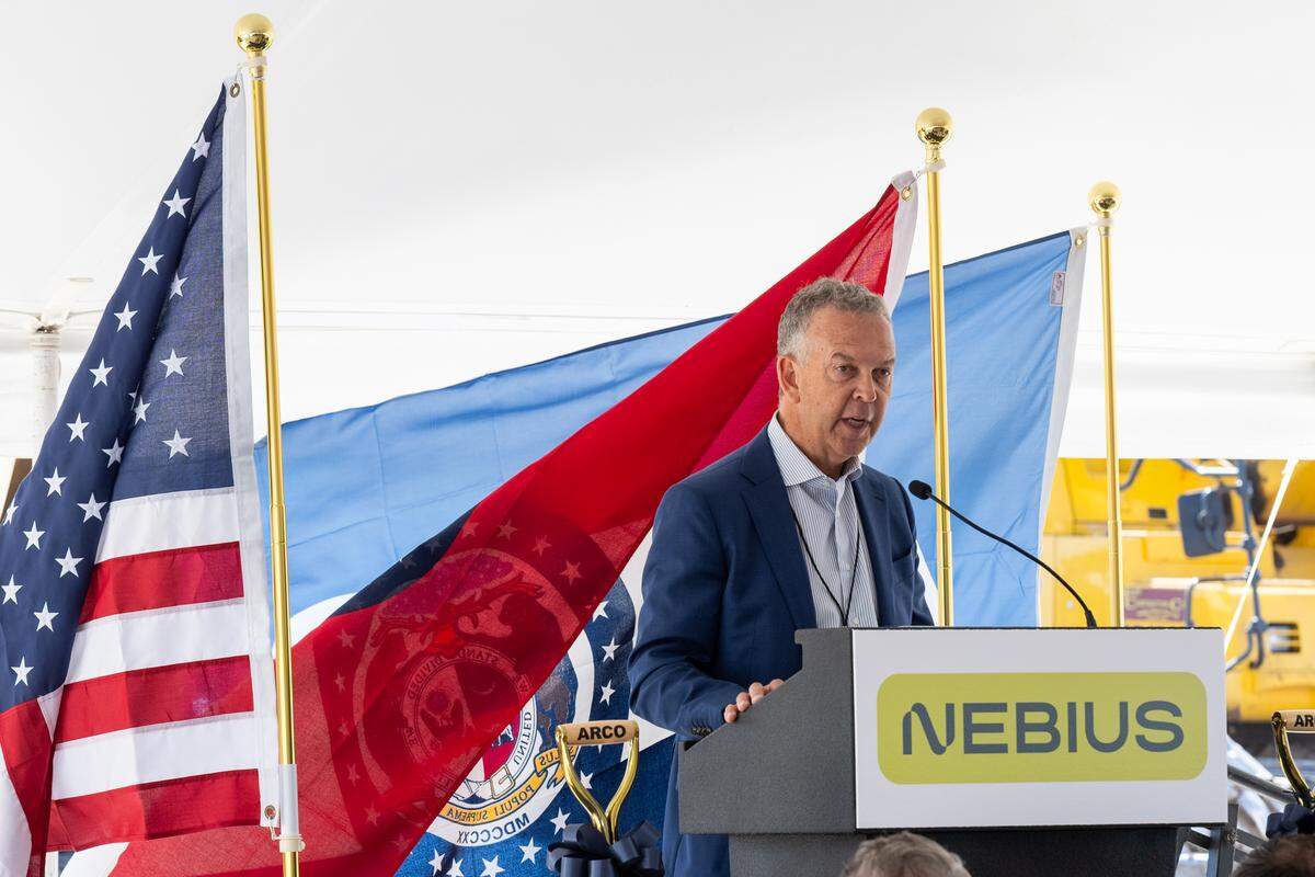 John Boynton, Independent Non-executive Chairman of the Board of Directors for Nebius Group, speaks to a gathering of people during a groundbreaking ceremony for a new AI data center being built in Independence, on Tuesday, May 12, 2026.