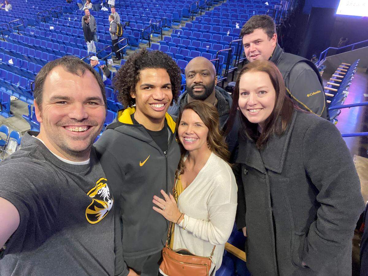 Missouri Tigers guard Dru Smith, second from left, poses for a photo with his family after the Mizzou game against Kentucky on Jan. 4.