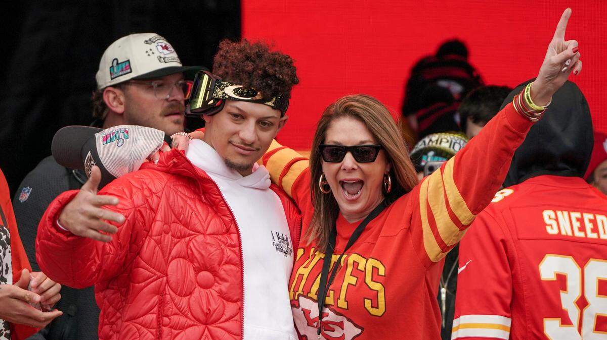 Kansas City Chiefs quarterback Patrick Mahomes celebrated with his mother, Randi Mahomes, during the Kansas City Chiefs Super Bowl LVII parade and rally.