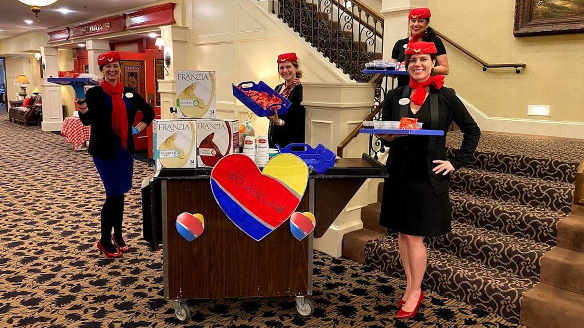 Brookdale staff members Jessica Arenholz, Esther Laddin, Alecia Evans and Veronica Latas run a Southwest Airlines-style snack cart for the residents.
