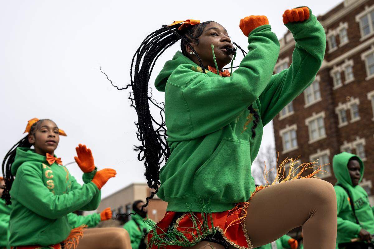 KC Marching Sizzlers dance during the St. Patrick's Day parade along Broadway Boulevard on Tuesday, March 17, 2026, in Kansas City.