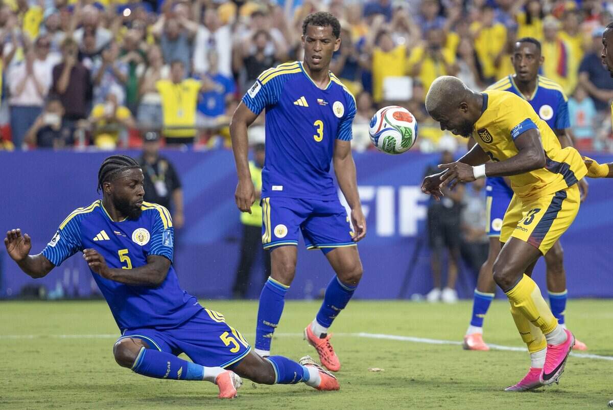 Ecuador forward Enner Valencia (13) tires to head the ball into the goal against Curaçao defender Sherel Floranus (5) during a FIFA World Cup group-stage soccer match at Kansas City (Arrowhead) Stadium in Kansas City on Saturday, June 20, 2026.