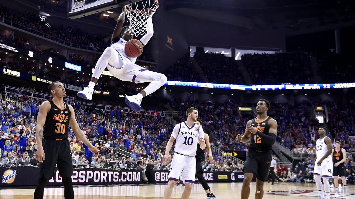 KU's Lagerald Vick helped put an exclamation point on the Jayhawks' win with this dunk during the second half of Thursday afternoon's Big 12 Tournament game at the Sprint Center. KU beat OSU, 82-68.