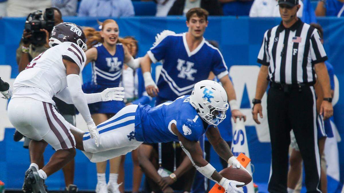 Kentucky Wildcats running back Ray Davis (1) dives into the end zone to make the final Wildcat touchdown against EKU Saturday. Davis had 52 yards rushing and 36 years receiving with one touchdown, Sept. 9, 2023.