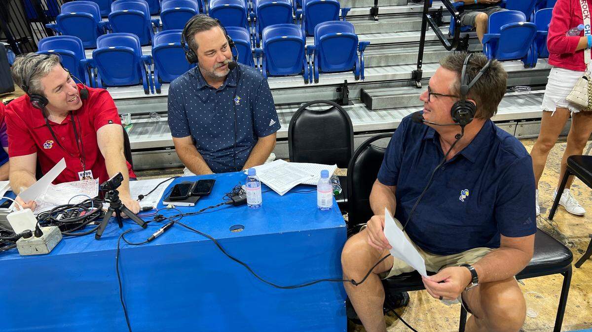 KU basketball coach Bill Self, right, spoke to former Jayhawk guard Greg Gurley (middle) and Brian Hanni, voice of the Jayhawks, on the court after KU’s win over Puerto Rico Select on Thursday, Aug. 3, 2023.
