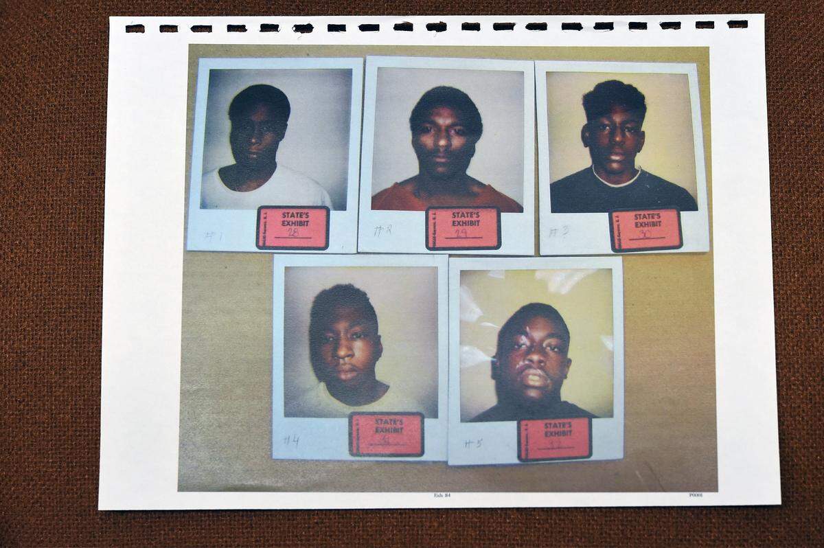 Photograph of five mug shots from the case file of Lamonte McIntyre, who was convicted for at the 1994 double homicide of two men in Kansas City, Kan. McIntyre has been incarcerated in Kansas for 22 years. A new motion and evidence calls for his exoneration.