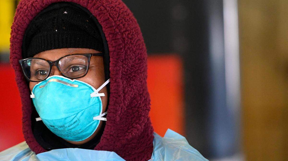 Tawonia Scott, a registered nurse, was masked up as she staffed a drive-thru COVID-19 testing clinic Wednesday, January 5, 2022, at 616 N.E. Douglas St., in Lee’s Summit.