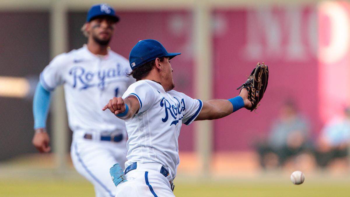 Royals third baseman Nicky Lopez can’t haul in a short fly ball during the second inning of Wednesday evening’s game against the Cleveland Guardians at Kauffman Stadium.