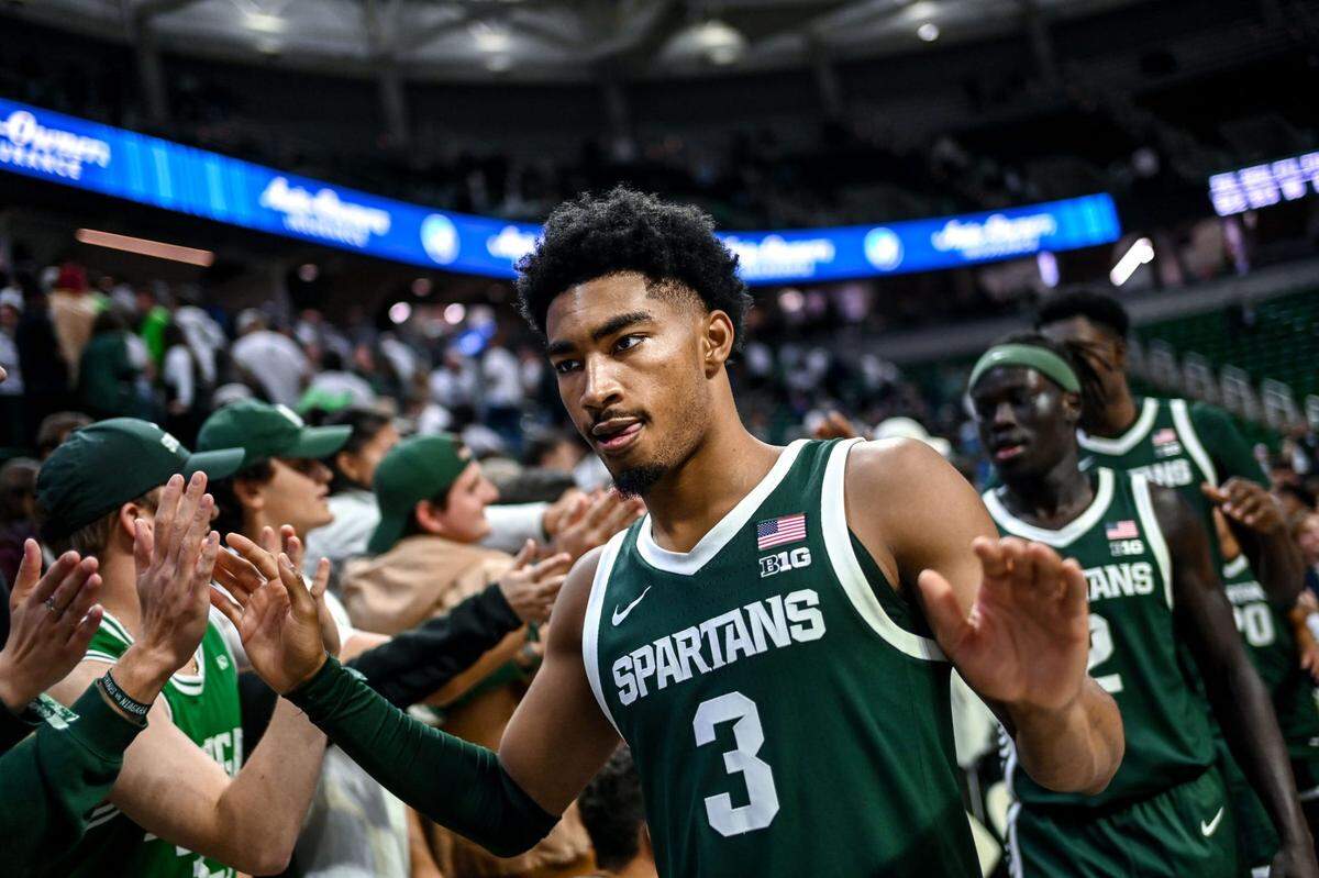 Michigan State’s Jaden Akins slaps hands with fans after the Spartans’ victory over Niagara on Thursday, Nov. 7, 2024, at the Breslin Center in East Lansing.