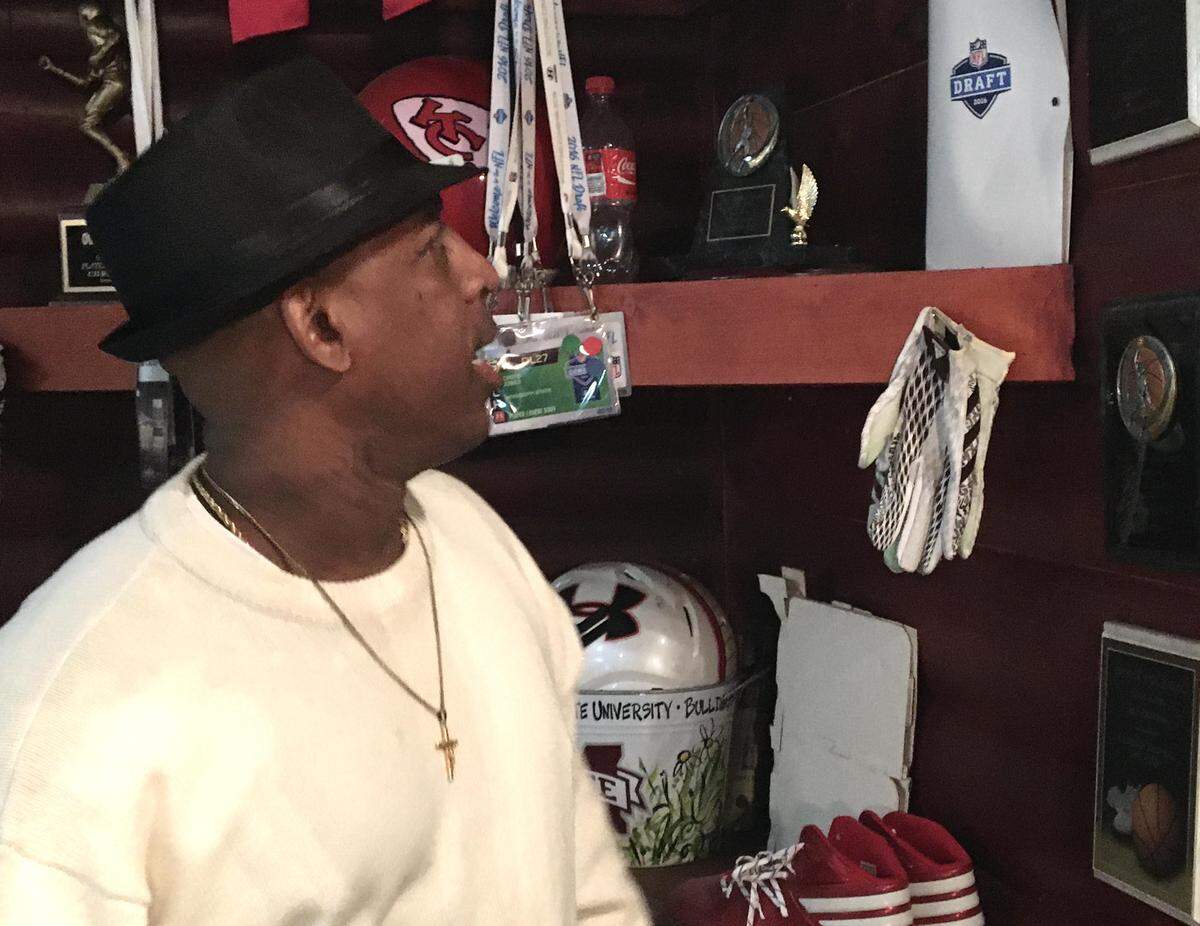 Chris Jones Sr. has a wall full of memorabilia and awards won by his son, Chris Jones of the Kansas City Chiefs, at the family’s home in Mississippi.