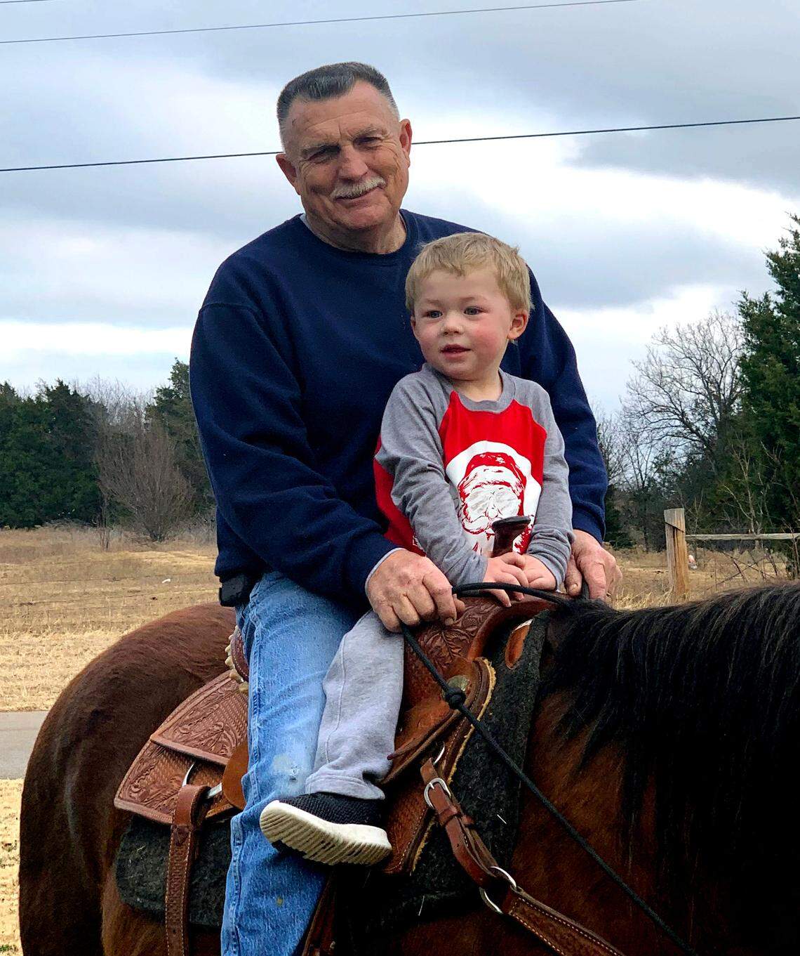 Gene Byrd with his great-grandson Colt McDonald, who was 3 when this photograph was taken at the Byrds’ residence in Noble, Okahoma.