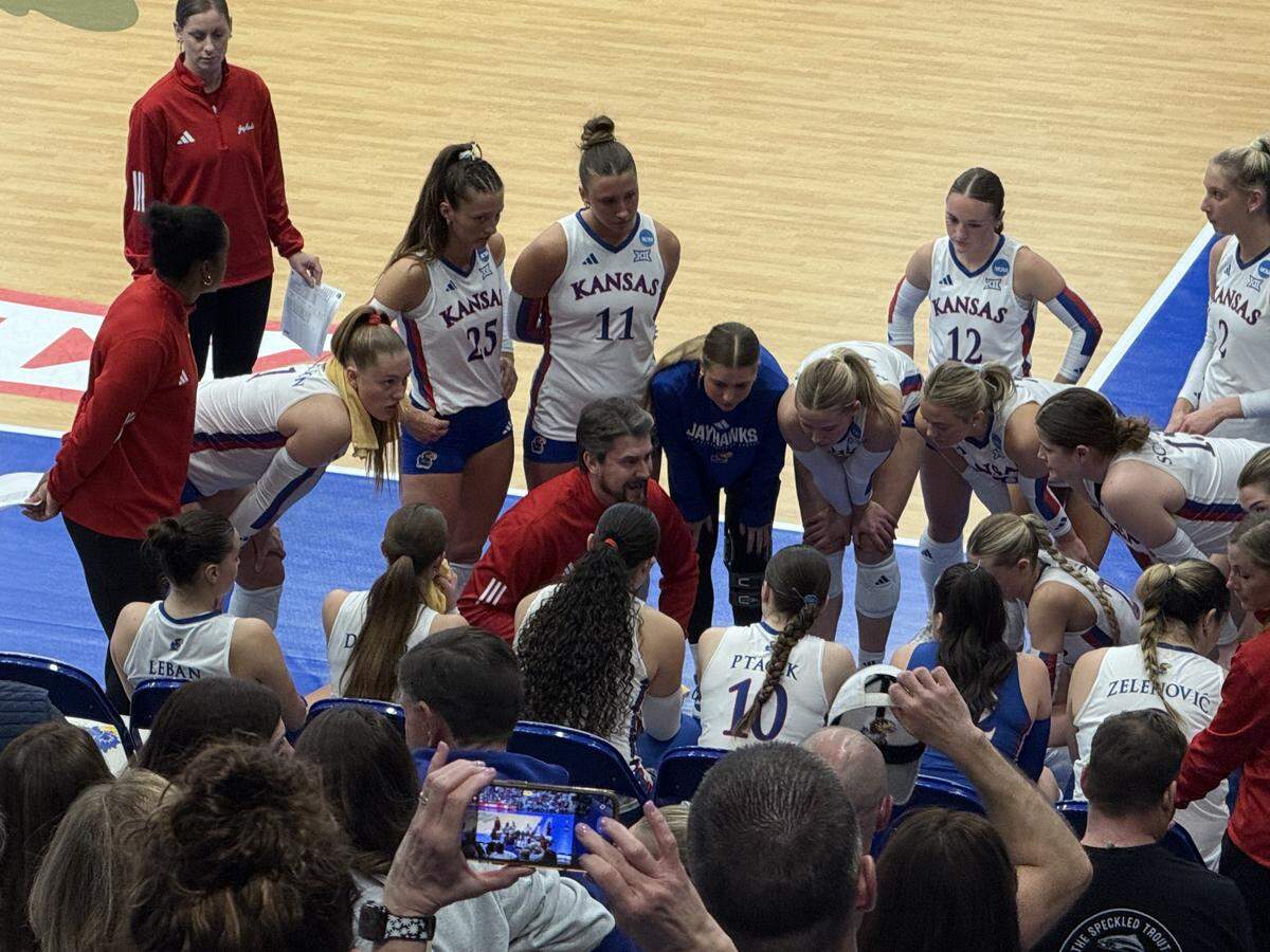 Kansas volleyball coach Matt Ulmer instructs his Jayhawk team during a timeout on Friday, Dec. 5, 2025 at Horejsi Family Volleyball Arena in Lawrence, Kansas. KU beat Miami 3-1, in an NCAA Tournament round-of-32 contest.