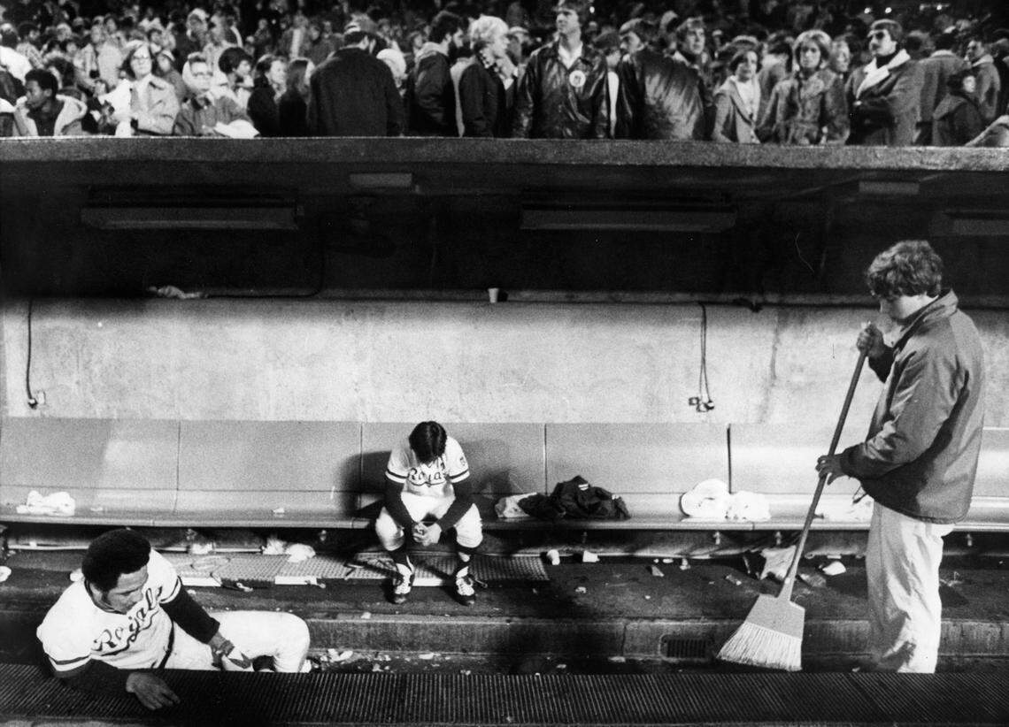 So quiet and oh, so very much alone, teammates Amos Otis (left) and Freddie Patek lowered their heads after the Yankees silenced the Royals in 1977.