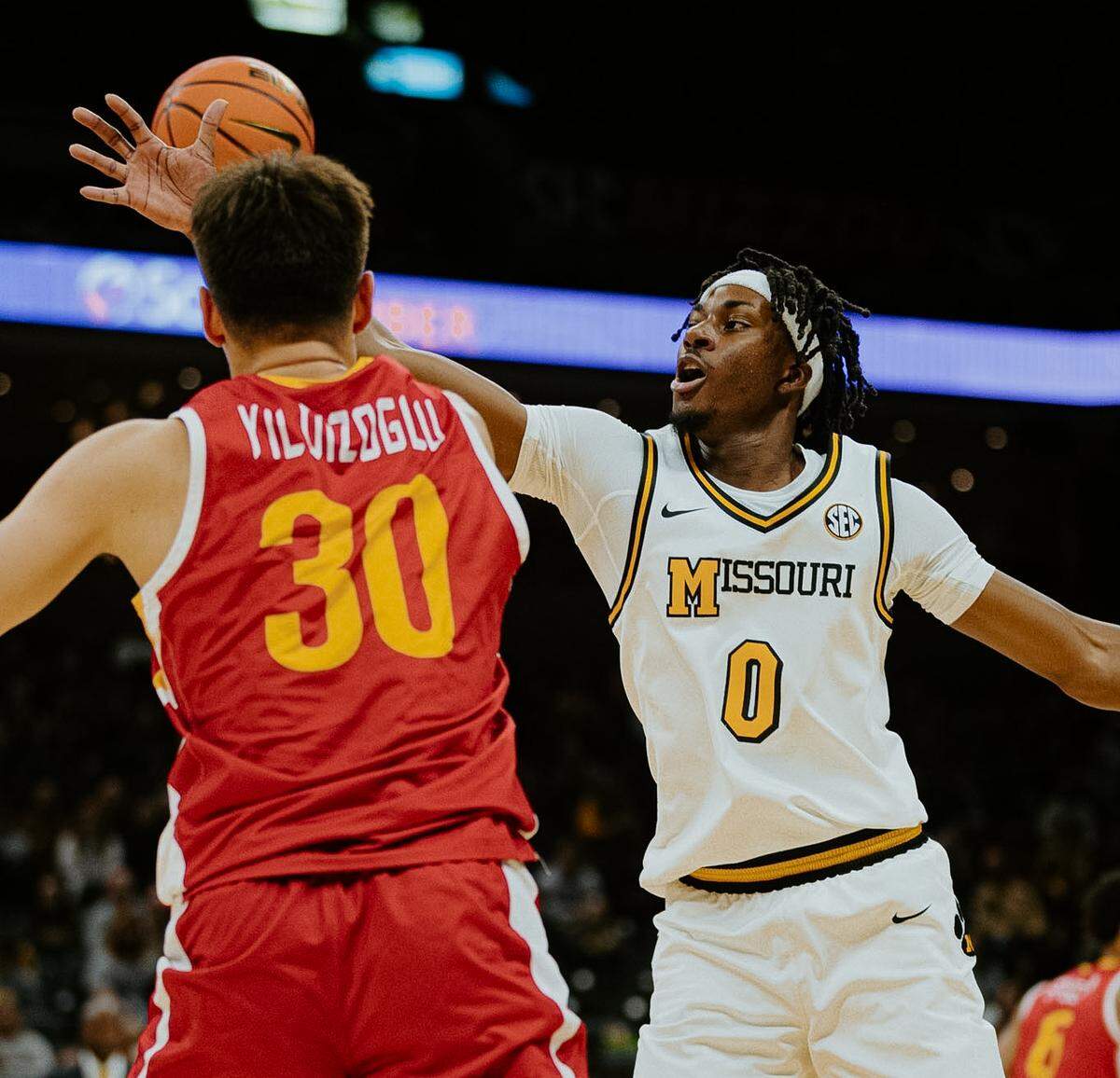 Mizzou guard Anthony Robinson (No. 0) reaches for the ball during a game against VMI at Mizzou Arena in Columbia on Nov. 9, 2025.