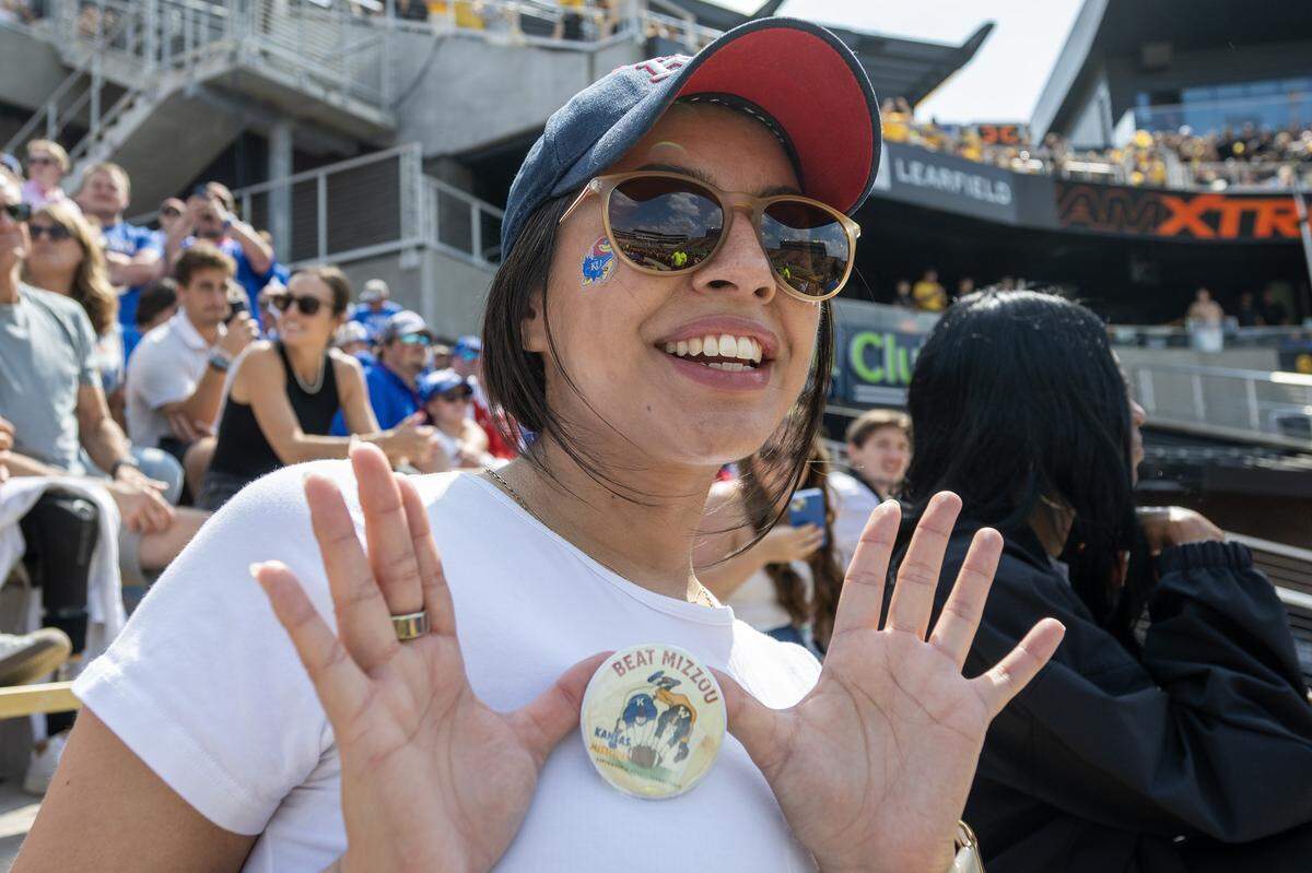 Nikki Escalante shows her pin before the start of a game between the Missouri Tigers and Kansas Jayhawks Faurot Field at Memorial Stadium is pictured on Saturday, Sept. 6, 2025, in Columbia.