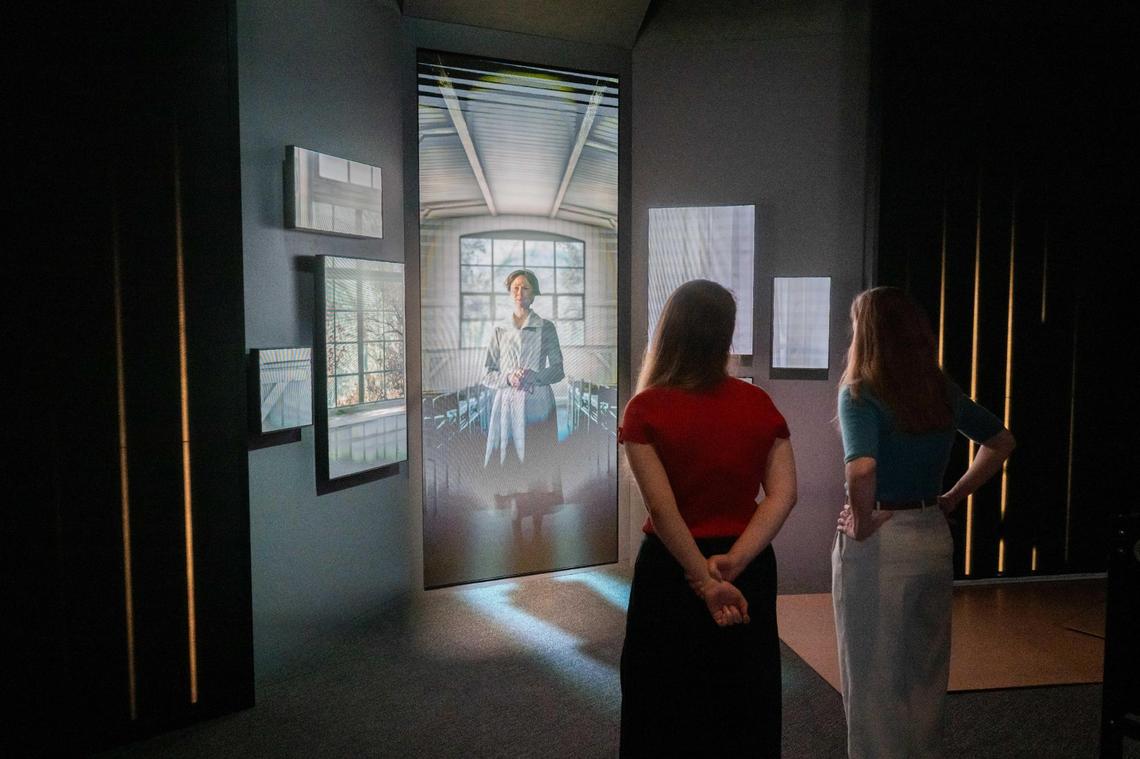 National WWI Museum and Memorial staff take in Encounters, a new exhibit at the World War I Museum and Memorial, opened to the media for a sneak peak ahead of Memorial Day, on Wednesday, May 21, 2025. The exhibit uses immersive technology to share first-person narratives, performed by actors, of those impacted by the Great War. The exhibit uses immersive lighting, ultra fine LED boards, and Holoplot spacial audio, the same as used in the Sphere in Las Vegas.