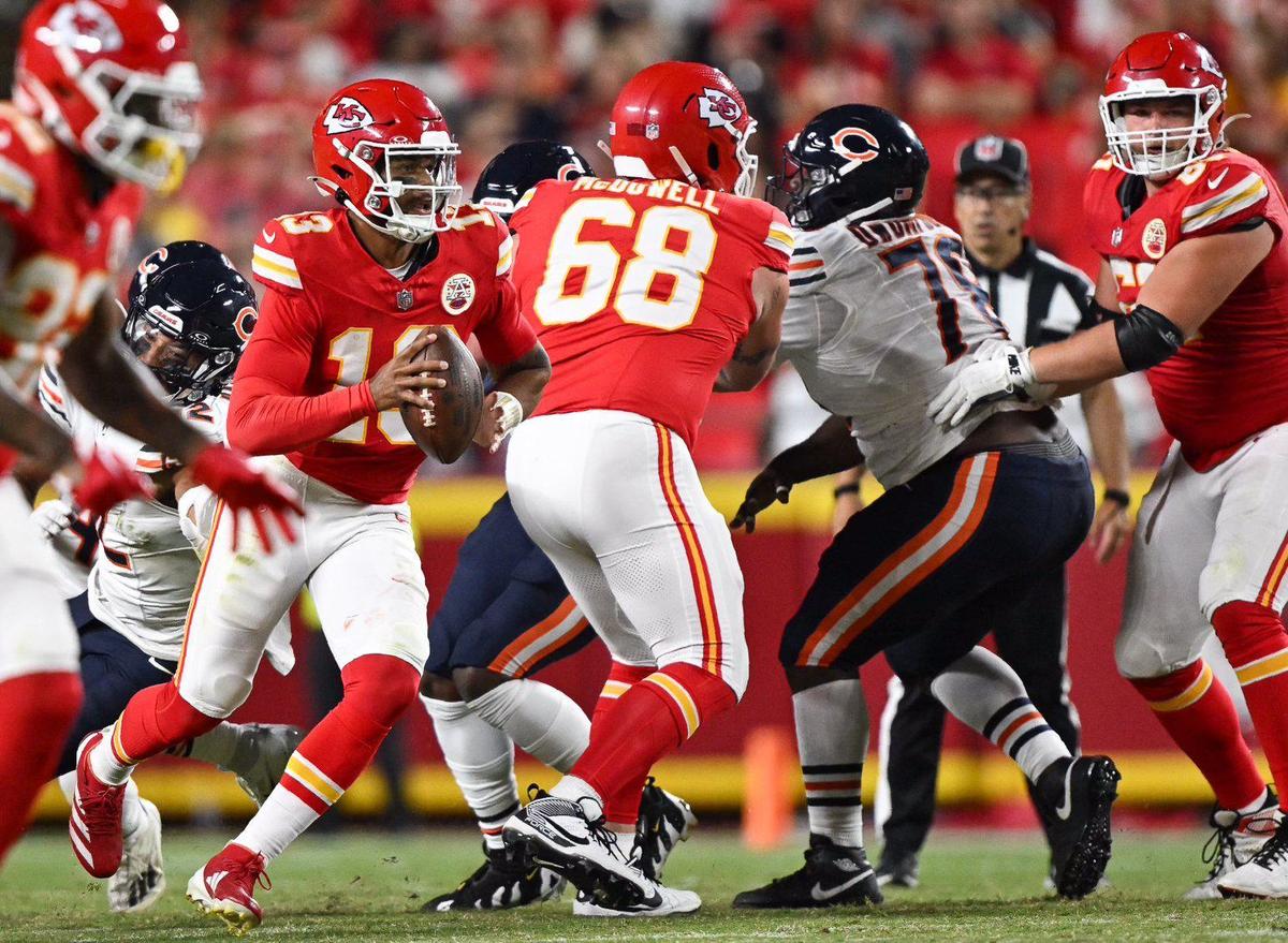Kansas City Chiefs quarterback Chris Oladokun (13) looks for an open receiver Thursday, Aug. 22, 2024, in the second half against the Chicago Bears at GEHA Field at Arrowhead Stadium.