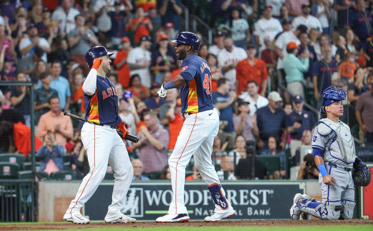 Astros left fielder Yordan Alvarez celebrates with catcher Yainer Diaz after hitting a fourth-inning home run off Kansas City Royals starting pitcher Alec Marsh on Sunday afternoon at Minute Maid Park in Houston.