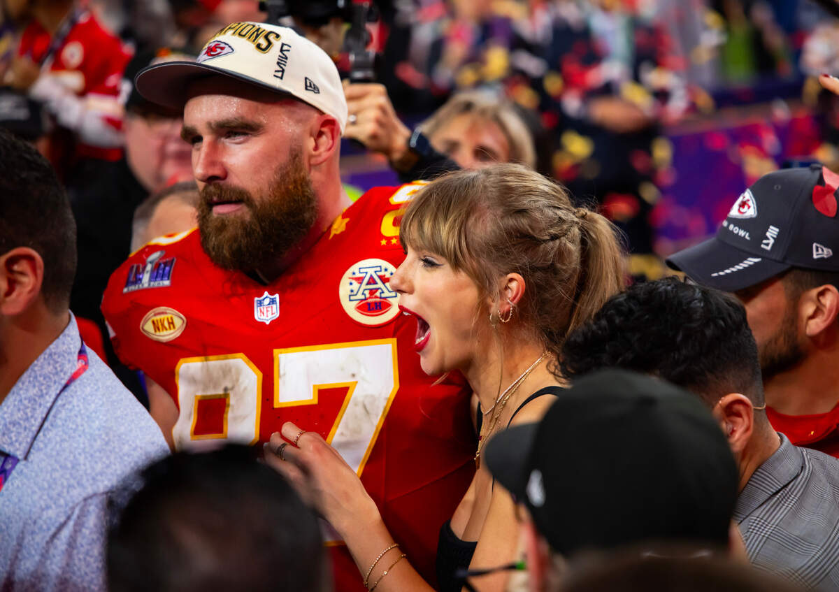 Travis Kelce celebrates with Swift after defeating the San Francisco 49ers in Super Bowl LVIII at Allegiant Stadium.