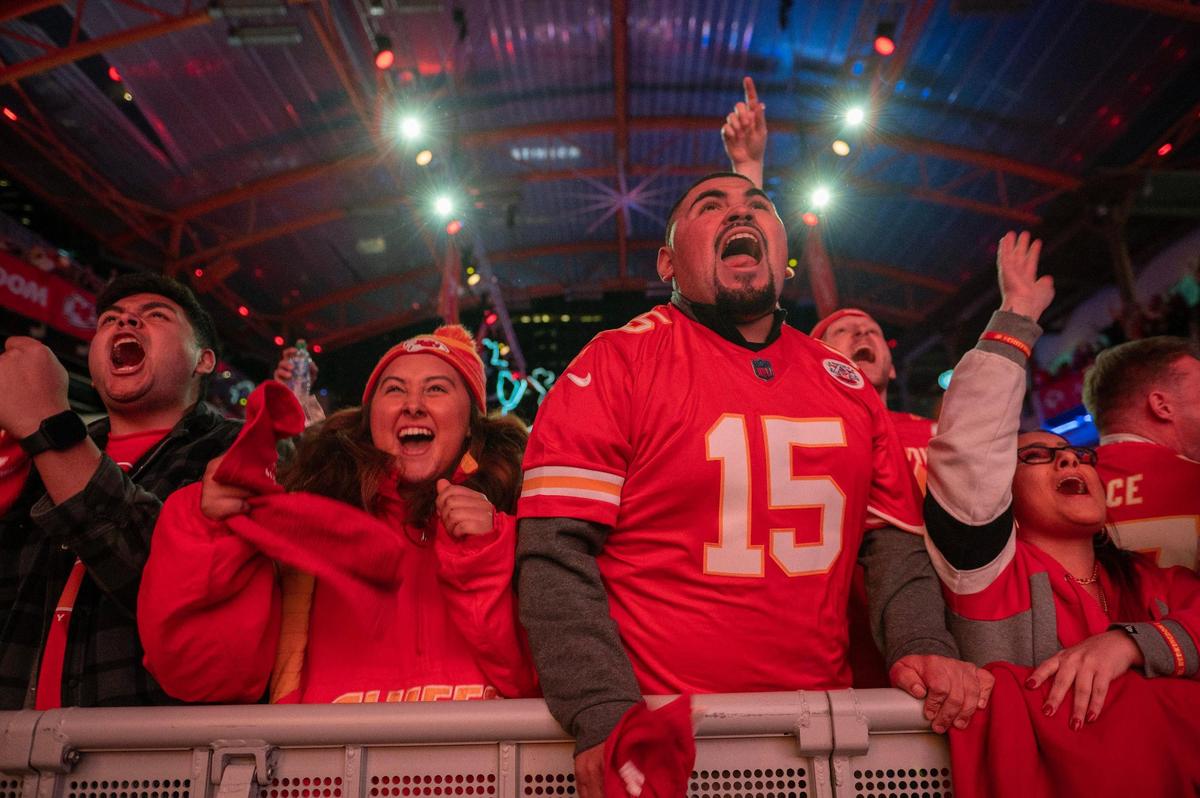 Fans celebrate a touchdown by Kansas City Chiefs linebacker Nick Bolton at the Super Bowl LVII watch party at Power and Light District on Sunday, Feb. 12, 2023, in Kansas City.