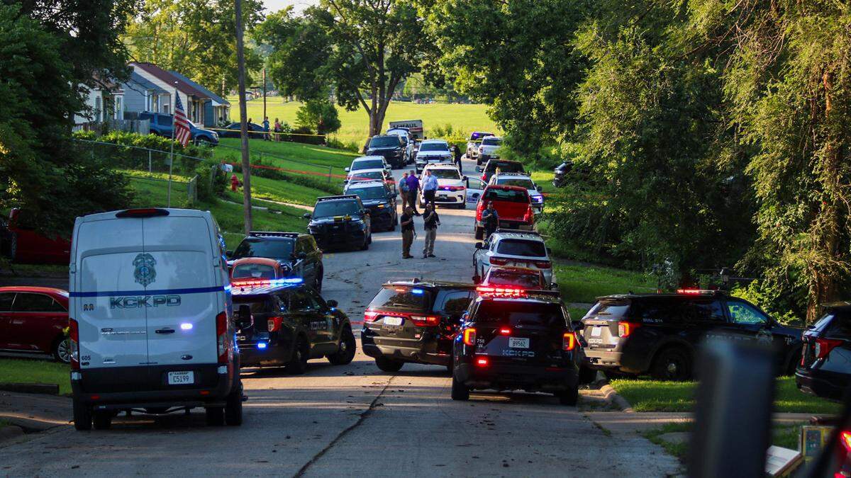 The shooting involving a police deputy and someone inside a house in Kansas City, Kansas, drew a large police response, seen around 7 p.m. on Saturday, July 26.