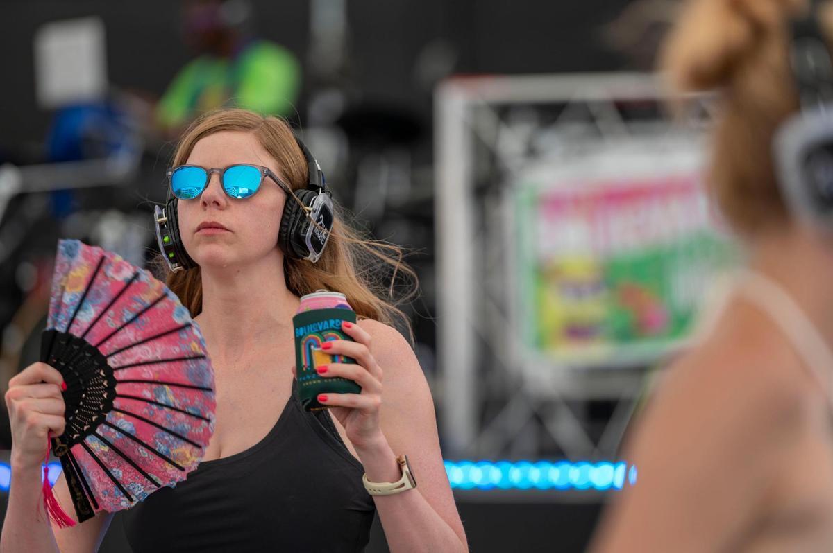 Emma Brooke dances in the silent disco stage at the Boulevardia festival in Kansas City on Saturday, June 18, 2022.