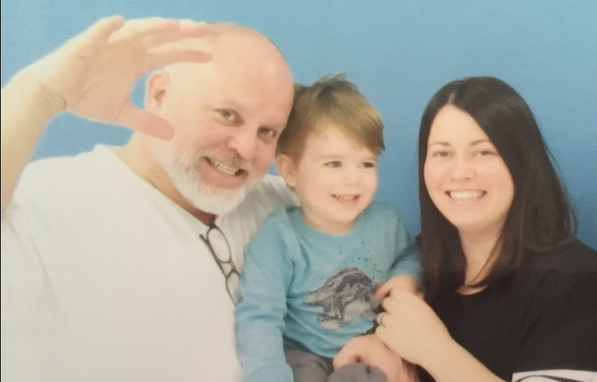 Cara Hill, right, of Kansas City, and her 2-year-old son pose with her father inside Crossroads Correctional Center in November 2017. Hill’s father has been at Crossroads for the last eight years after entering the prison system for a second-degree murder conviction 10 years ago.