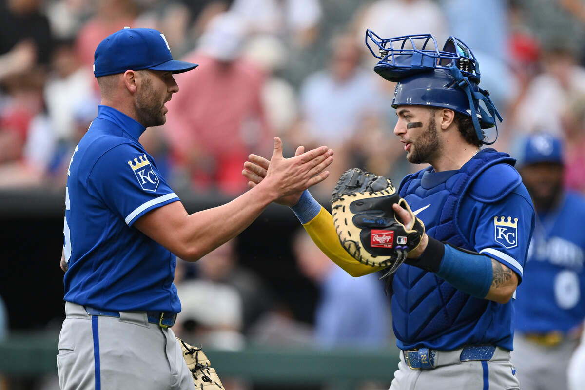 Kansas City Royals closer Alex Lange and Carter Jensen celebrate after the game against the Chicago White Sox at Rate Field on June 28, 2026 in Chicago, Illinois.