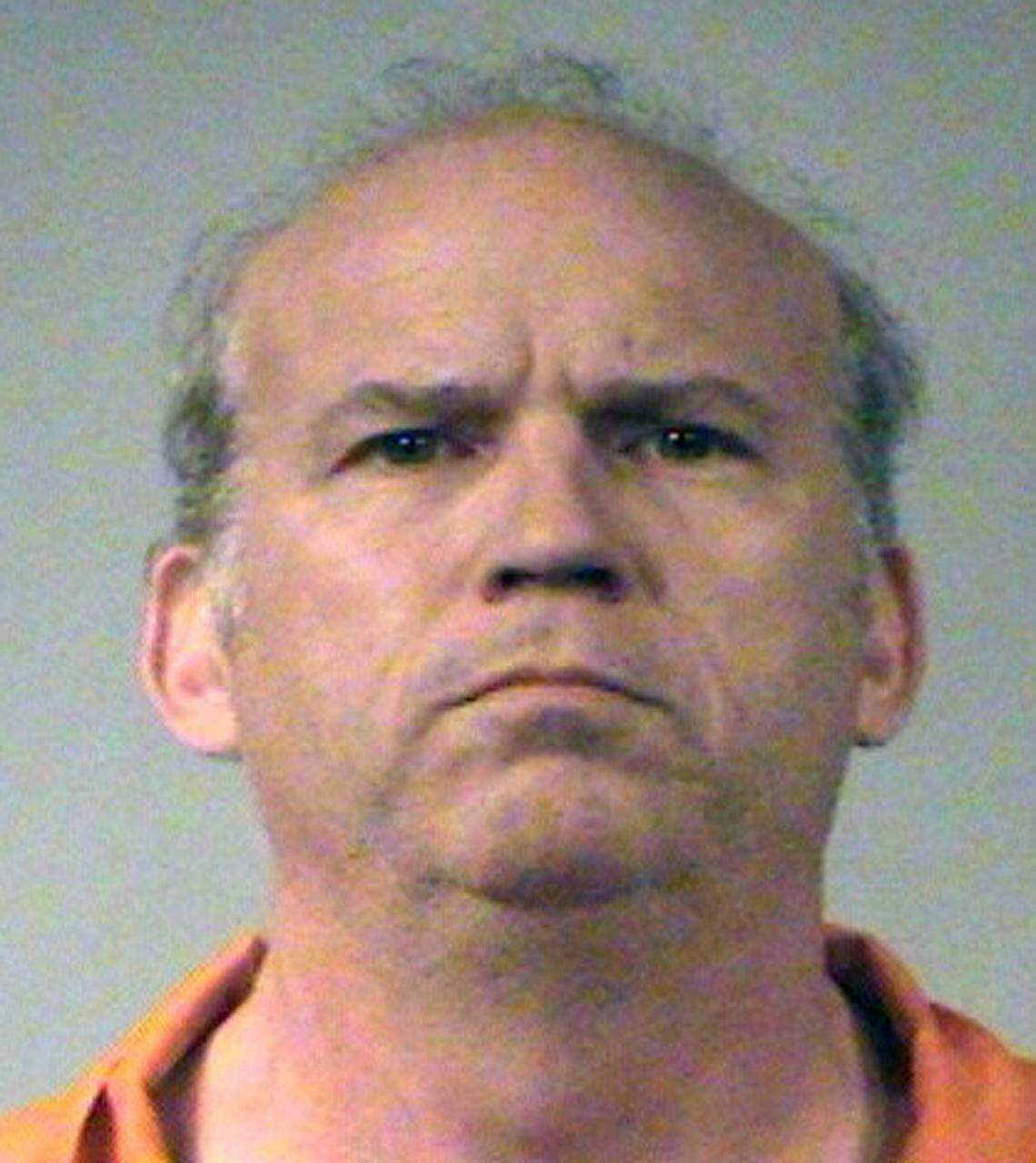 This undated booking photo originally released Tuesday, June 2, 2009 by the Sedgwick County Jail shows Scott Roeder.