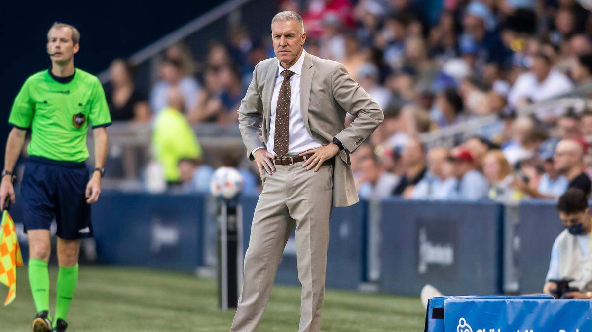 Sporting KC head coach Peter Vermes watches the run of play during the match between Sporting Kansas City and FC Dallas played at Children’s Mercy Park in Kansas City, Kansas. on July 31, 2021.